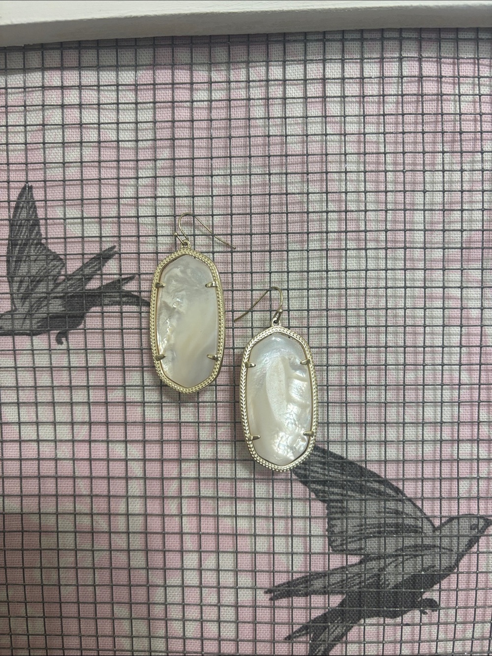 Kendra Scott White Mother-of-Pearl Oval Drop Earrings with Gold Trim